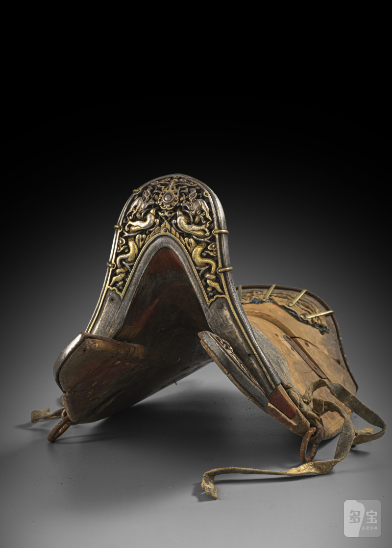 A RARE PARCEL GILT-IRON AND WOOD SADDLE WITH MOVABLE DERGE FITTINGS